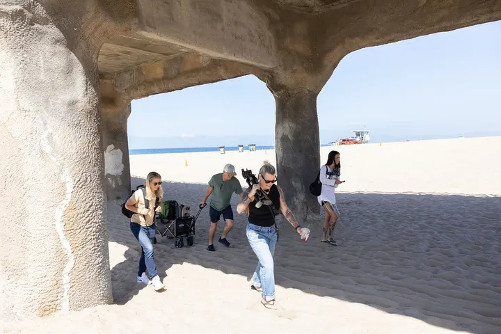 The crew shooting under the pier