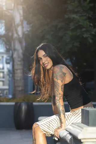 Liz between takes in the city