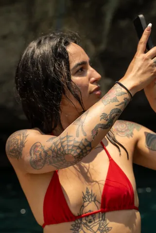 Liz filming from the water
